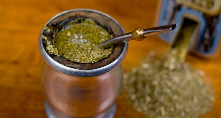 Yerba mate and a spoon in a pot